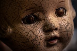 For Life Force Magazine; Strictly one-time use only. Pic 19: The aged and cracked head of an antique doll, which waits to be restored. Credit: Gary M Jones.